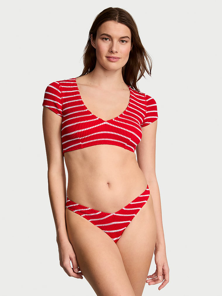 Victoria's Secret, Victoria's Secret Swim Crinkle Short-Sleeve Bikini Top, Red & White Stripes, onModelFront, 1 of 3 Mackenzie is 5'10" and wears 34B or Small