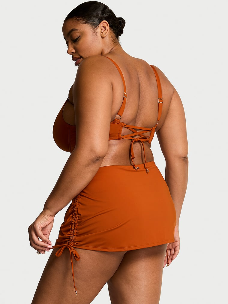 Victoria's Secret, Victoria's Secret Swim Essential Ruched Swim Skirt, Apple Cinnamon, onModelFront, 1 of 3