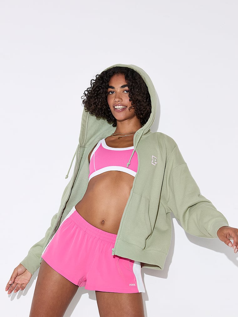 PINK Tech Woven Running Shorts, Pink Gossip, onModelSide, 1 of 4 Vanessa is 5'10" and wears Small