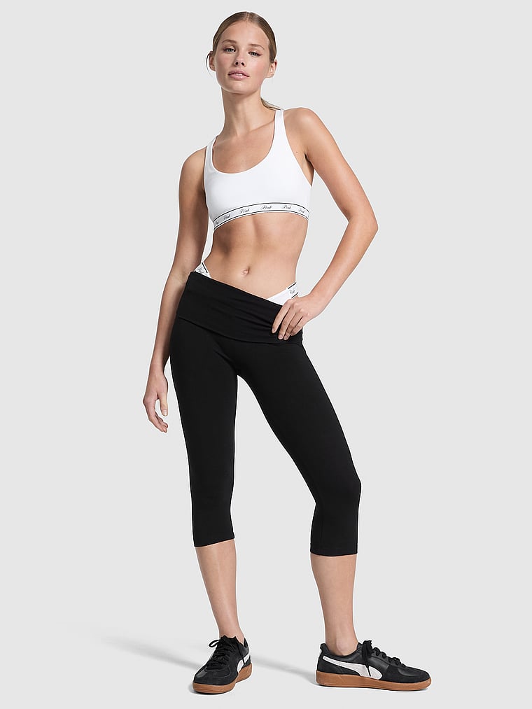 PINK All-Day Cotton™ Foldover Capri Leggings, Pure Black Solid, onModelFront, 1 of 3 Mari is 5'7" or 170cm and wears Small