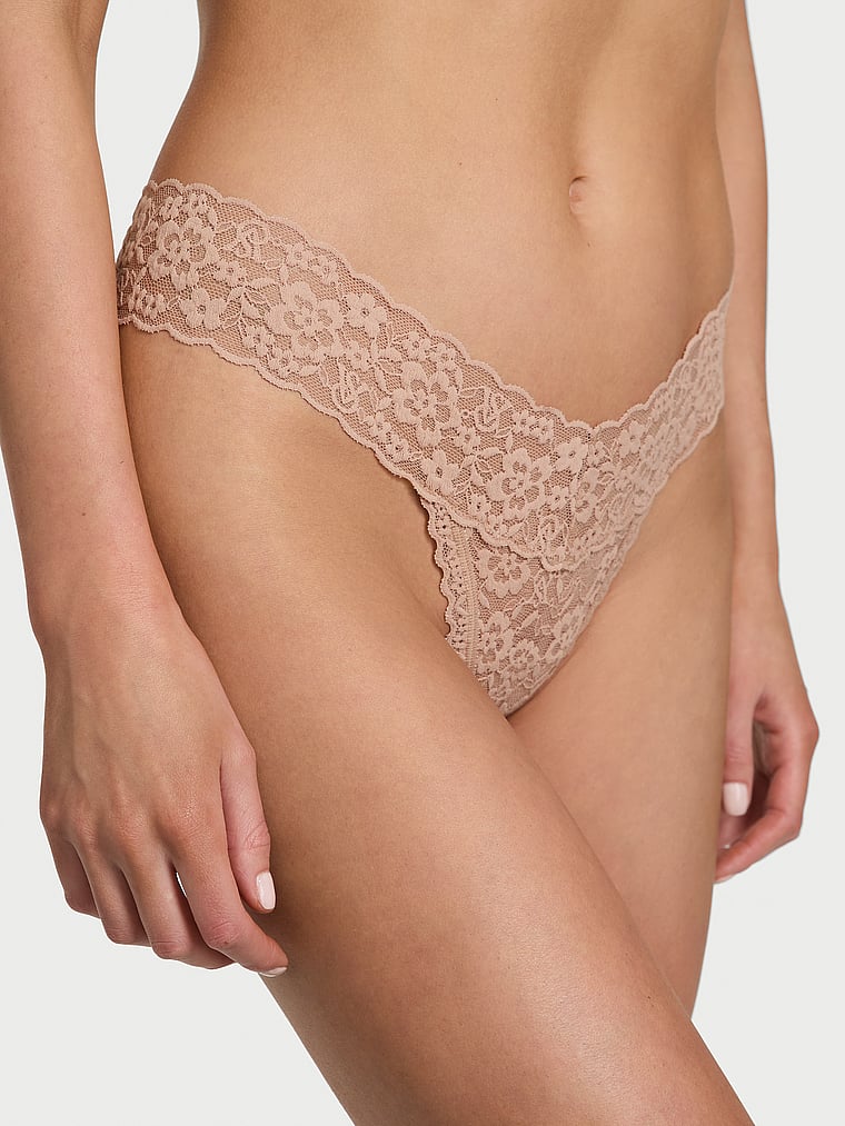 Victoria's Secret, The Lacie Lace Lace-Up Thong Panty, Praline, onModelFront, 1 of 3 Aga is 5'10" and wears Small