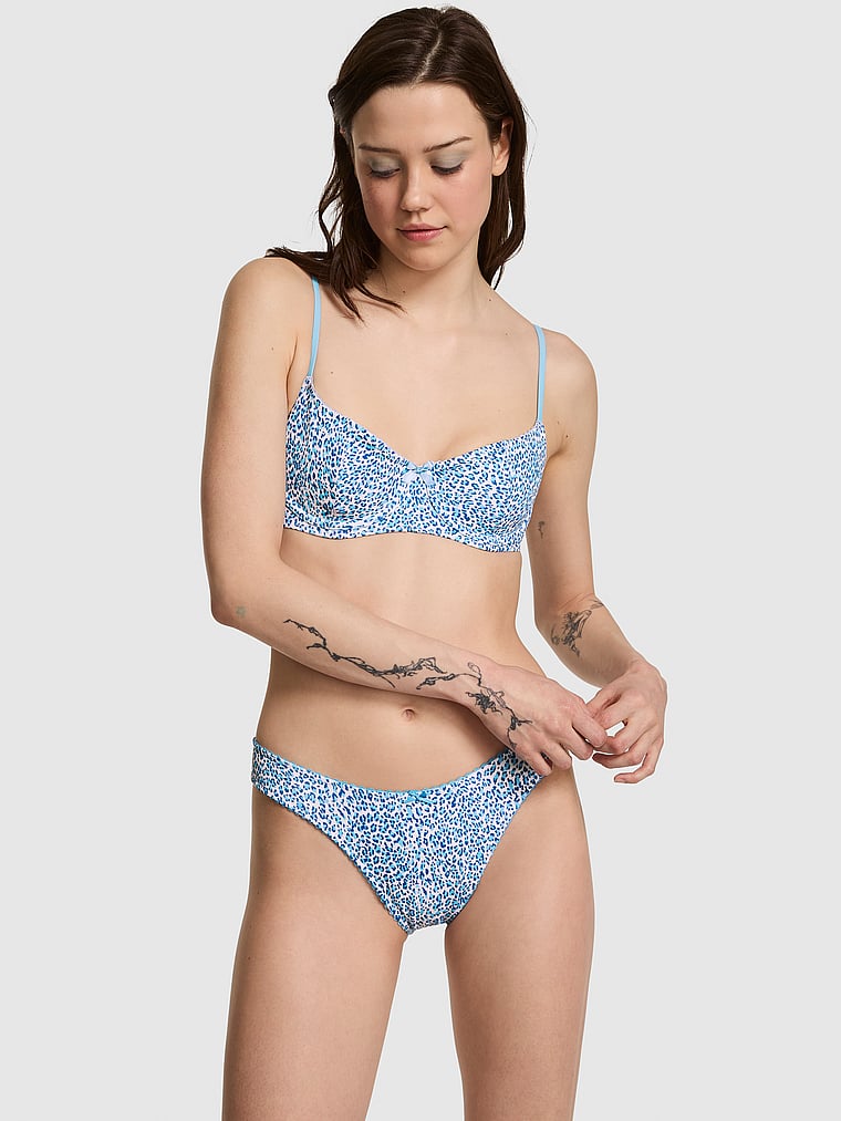 PINK by Frankies Bikinis Buttercup Bikini Top, Blue Leopard, onModelFront, 1 of 3 Sofia is 5'10" and wears 34B or Small