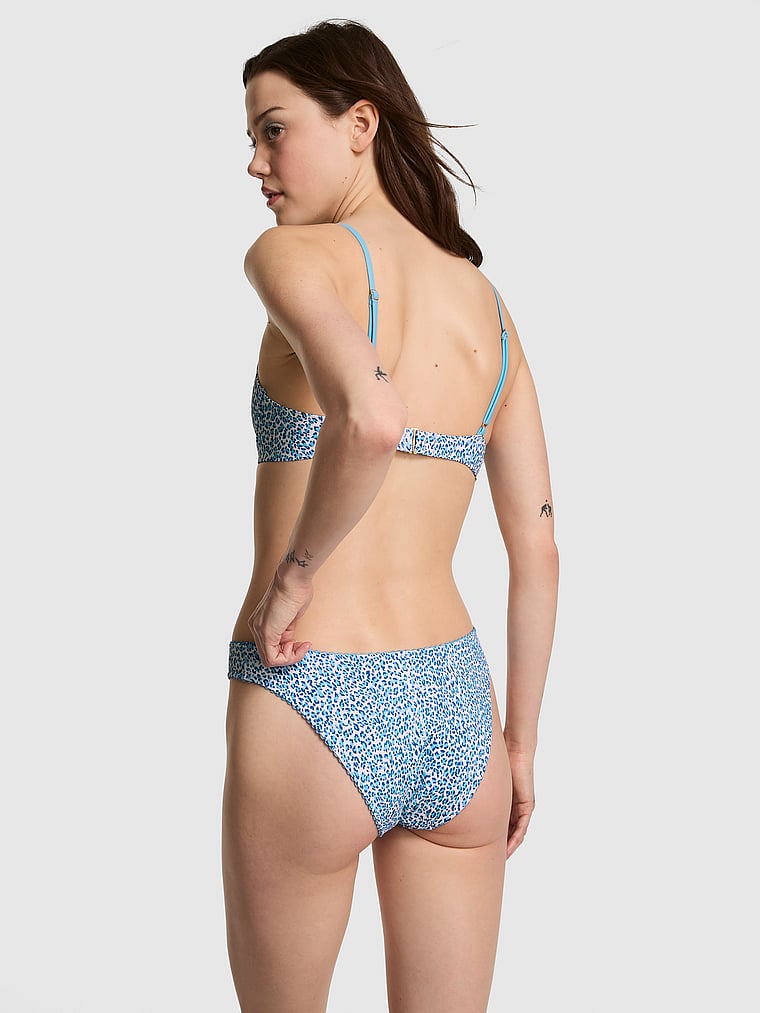 PINK by Frankies Bikinis Golden Hour Cheeky Rib Bikini Bottom, Blue Leopard, onModelFront, 1 of 3 Sofia is 5'10" and wears Small