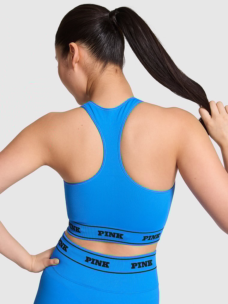 PINK Seamless Reversible Sports Bra, Blue Charge Print, onModelBack, 2 of 4 Gloria is 5'9" and wears 34D or Small
