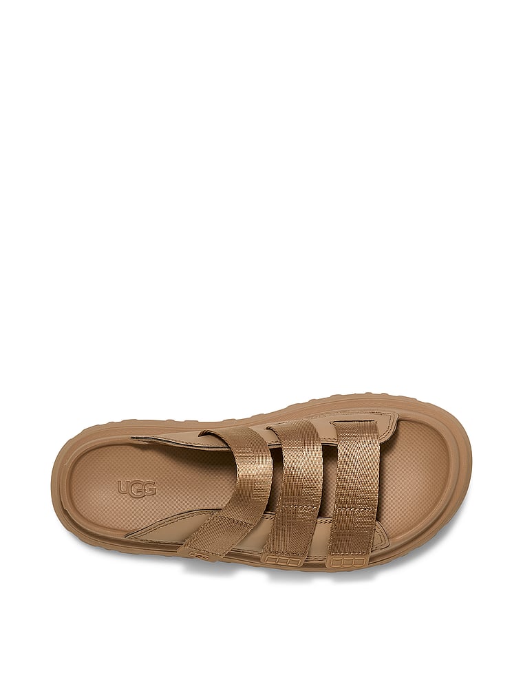 UGG® GoldenGlow Slides, Dark Sand, offModelFront, 3 of 4