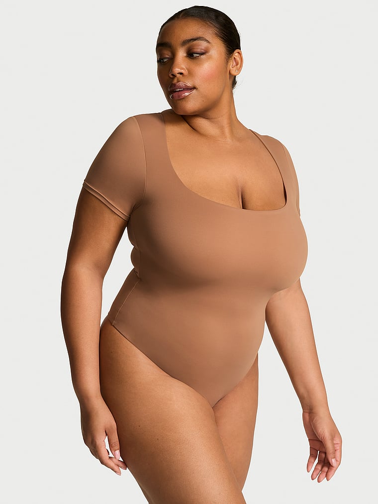 Victoria's Secret, Victoria's Secret Bodywear by Victoria with FeatherSoft™ Innovation Square-Neck Bodysuit, Toffee, onModelFront, 3 of 3 Brianna is 5'10" and wears Extra Large