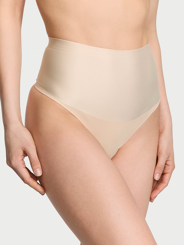 Victoria's Secret, Body by Victoria SmoothingShimmer™ Thong Panty, Marzipan, onModelFront, 1 of 3 Lotta is 5'10" and wears Small