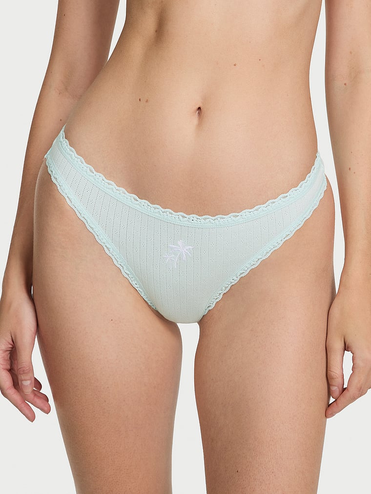 Victoria's Secret, Lace Trim Cotton Pointelle Lace-Waist Thong, Tradewinds Blue, onModelFront, 1 of 3 Tanya is 5'10" or 178cm and wears Small