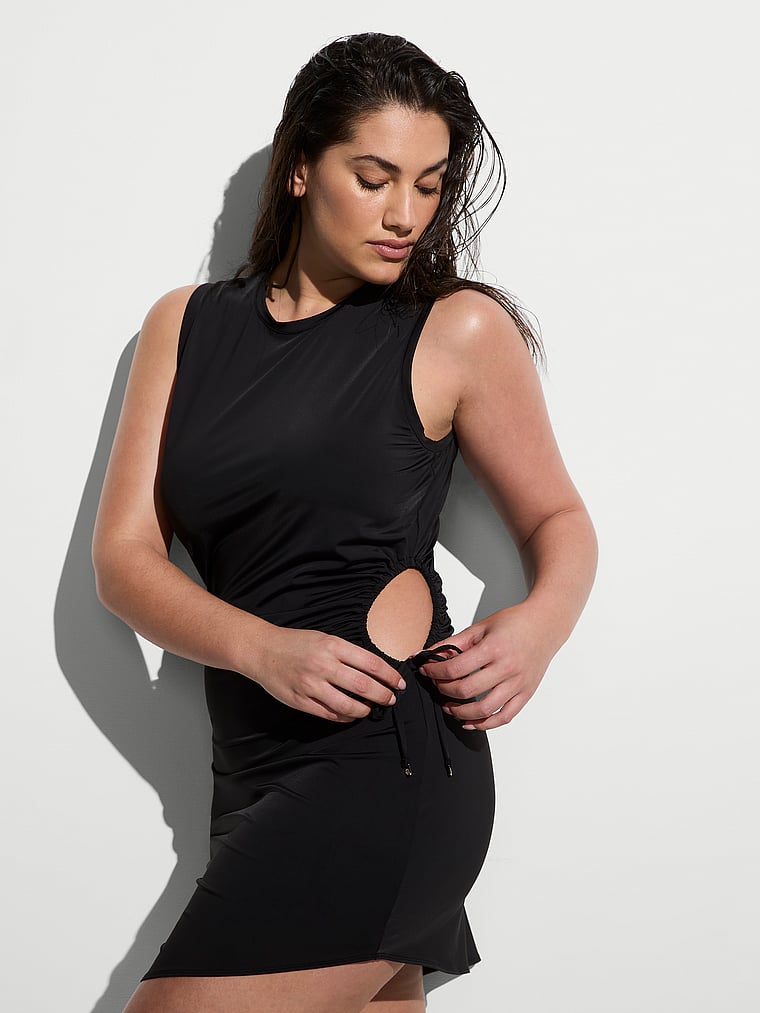 Victoria's Secret, Victoria's Secret Swim Beachwear Swim Ruched Mini Dress, Pure Black, onModelFront, 1 of 3 Lorena is 5'9" and wears 34DD (E) or Large