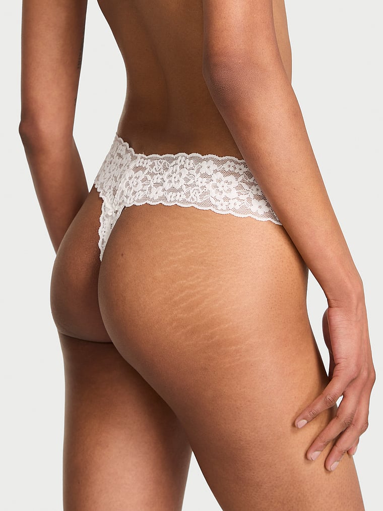 Victoria's Secret, The Lacie Lace Lace-Up Thong Panty, Coconut White, onModelBack, 2 of 3 Shaanti is 5'9" and wears Small