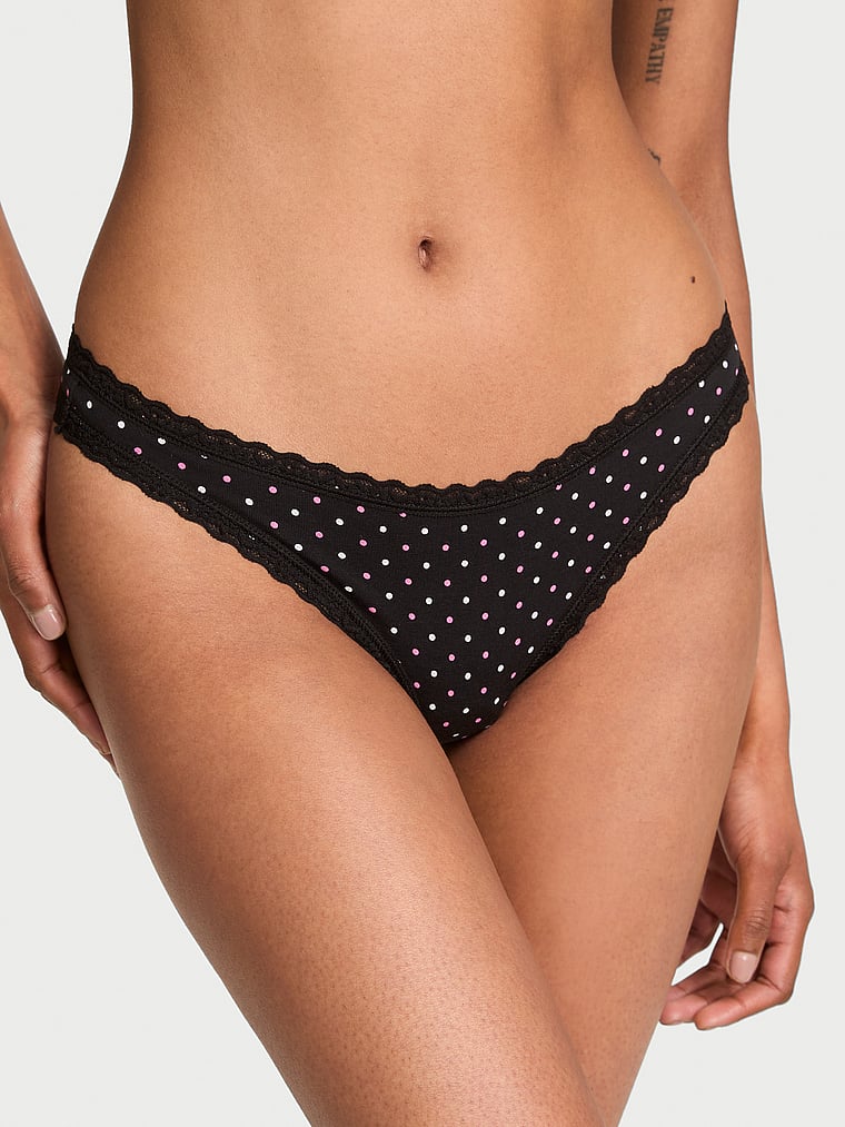 Victoria's Secret, Lace Trim Cotton Shadow Stripe Lace-Waist Thong Panty, Black Dots, onModelFront, 1 of 3 Shaanti is 5'9" or 175cm and wears Small