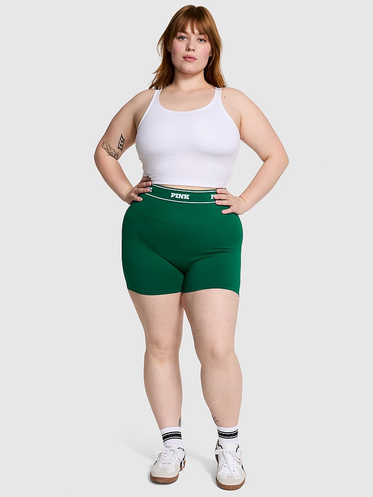 PINK Seamless Logo 3" Bike Shorts, Jaguar Green, onModelFront, 1 of 4 Lulu is 5'7" or 170cm and wears Large