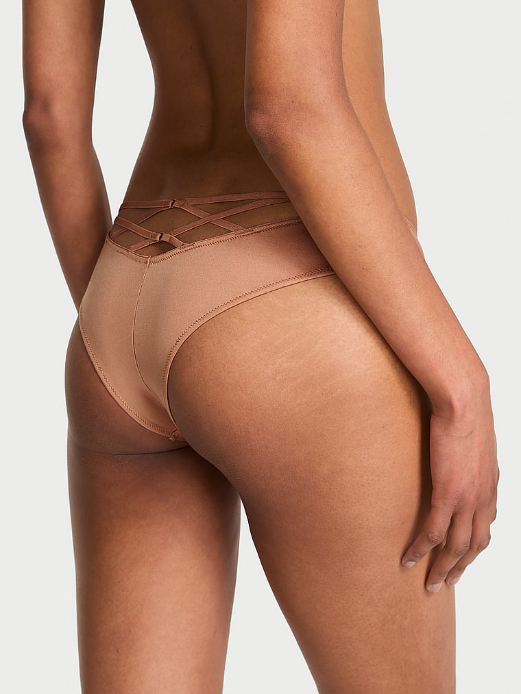 Victoria's Secret, Very Sexy Smooth Strappy-Back Tanga Panty, Toffee, onModelBack, 2 of 3 Shaanti is 5'9" or 175cm and wears Small