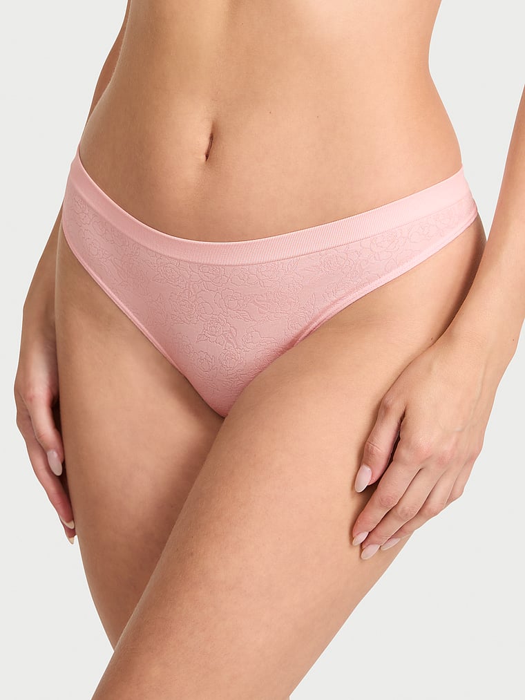 Victoria's Secret, Seamless Seamless Sparkle Logo Thong Panty, Angel Pink Sketch Floral, onModelFront, 1 of 3 Ari is 5'9" and wears Small