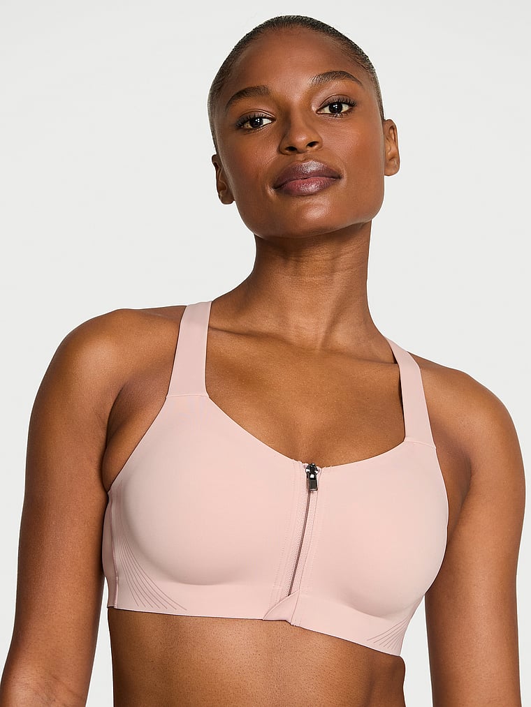 Victoria's Secret, VSX VSX Knockout™ Front-Close Sports Bra, Bare Pink, onModelFront, 1 of 3 Tsheca  is 5'9" or 175cm and wears 34B or Small