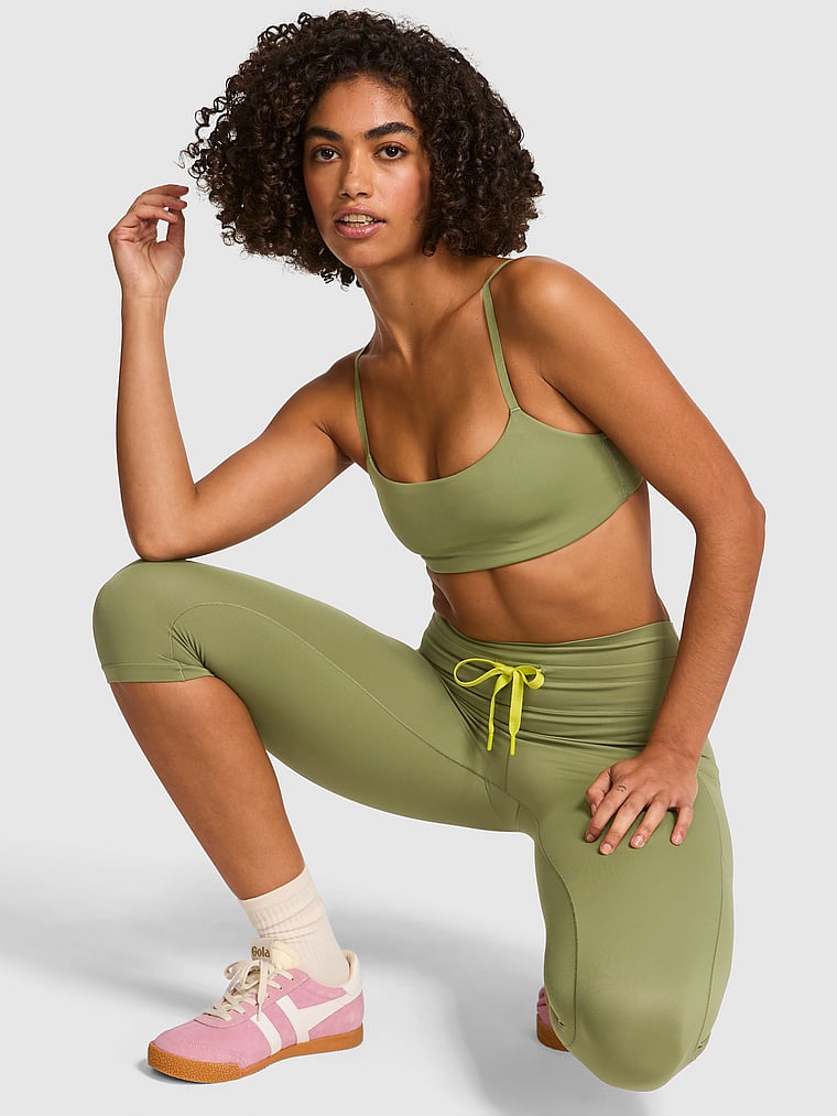PINK Relay Tech Capri Leggings, OLIVE SHADE, onModelFront, 1 of 3 Vanessa is 5'10" or 178cm and wears Small
