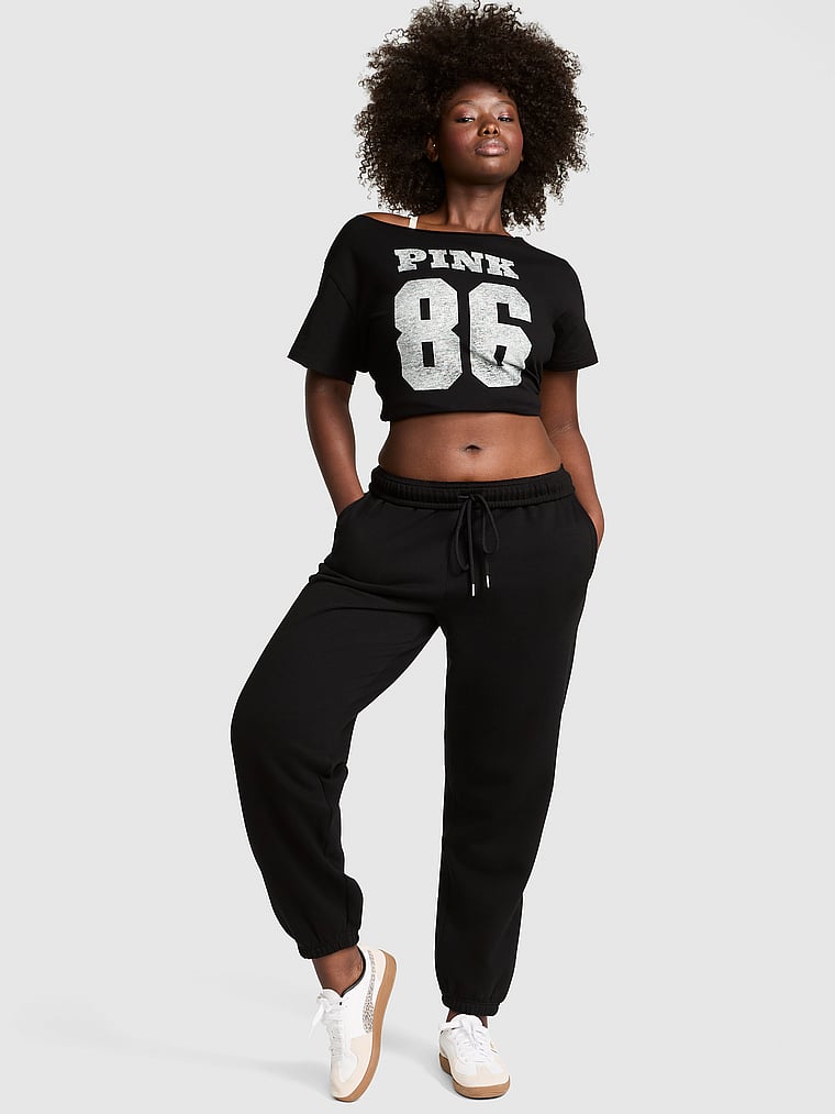 PINK Ivy Fleece Campus Sweatpants, Pure Black, onModelFront, 1 of 4 Fanta is 5'11" or 180cm and wears Medium
