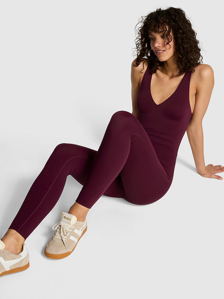 PINK Relay Plunge Onesie, Wild Rose, onModelFront, 1 of 3 Rae is 5'10" and wears Small