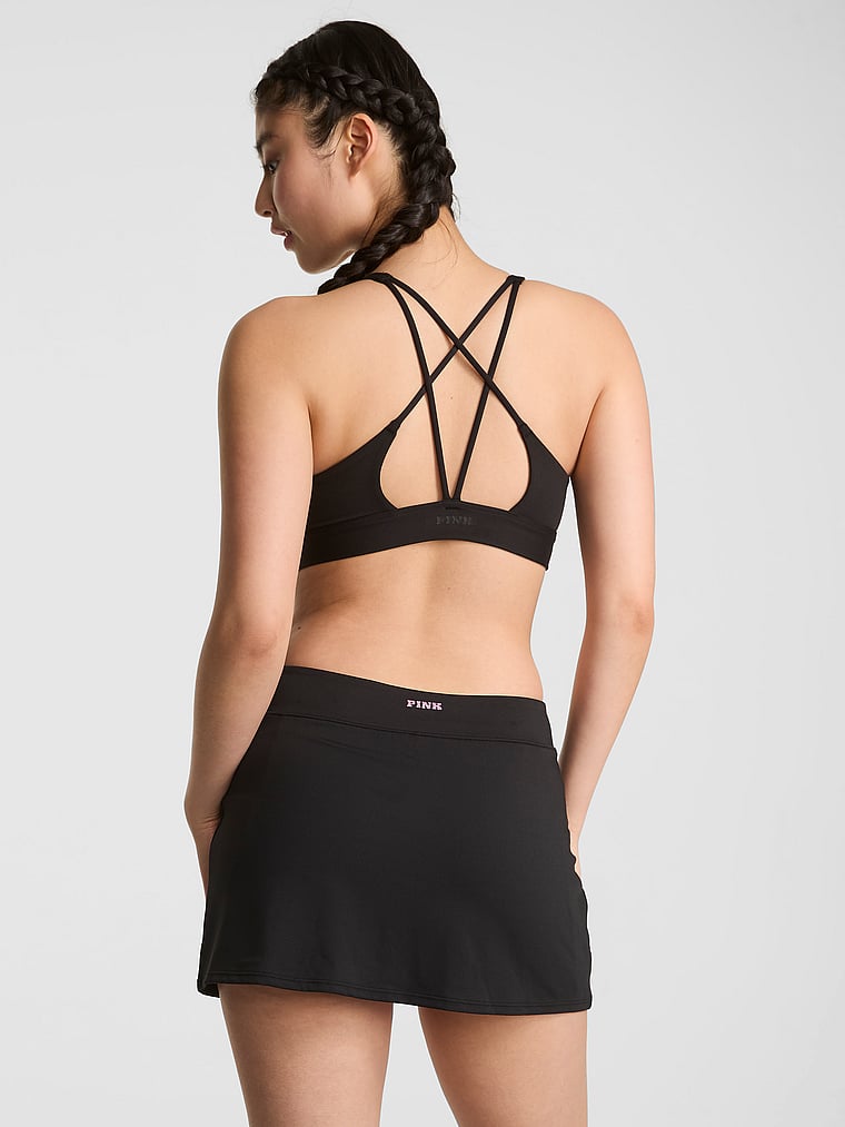 PINK Relay Micro Skirt, Pure Black, onModelBack, 2 of 5 Gloria is 5'9" and wears Small