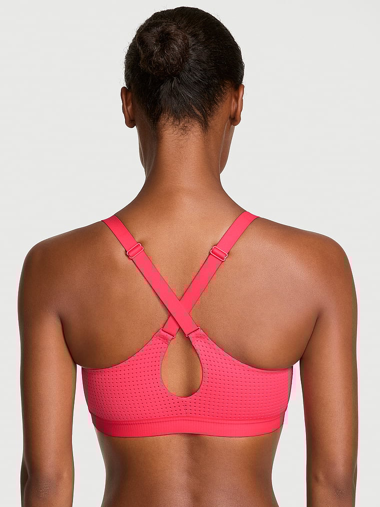Victoria's Secret, VSX VSX Lightweight Mesh 2.0 Sports Bra, Pink Island, onModelBack, 2 of 3 Ange-Marie is 5'10" and wears 34B or Small