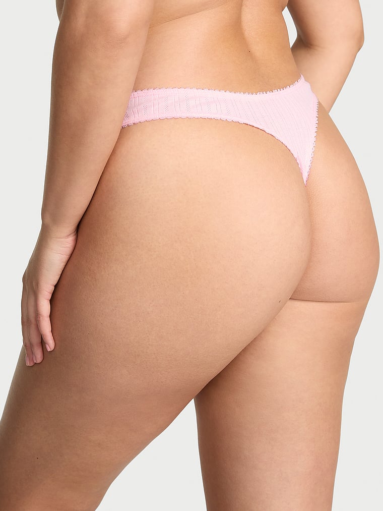 Victoria's Secret, Victoria's Secret Stretch Pointelle High-Leg Scoop Thong Panty, Pretty Blossom, onModelBack, 2 of 4 Karmi is 5'10" or 178cm and wears Large