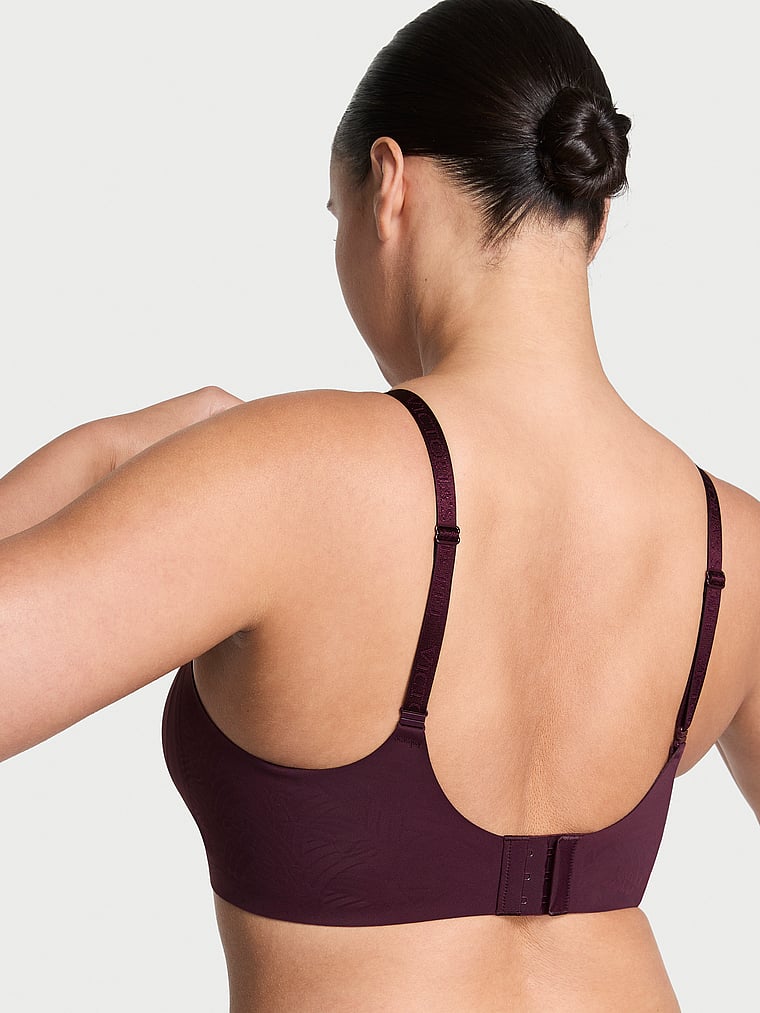 Victoria's Secret, The T-shirt Lightly Lined Wireless Comfort Bra, Winter Wine, onModelBack, 2 of 3 Karmi is 5'10" and wears 34DD (E) or Large