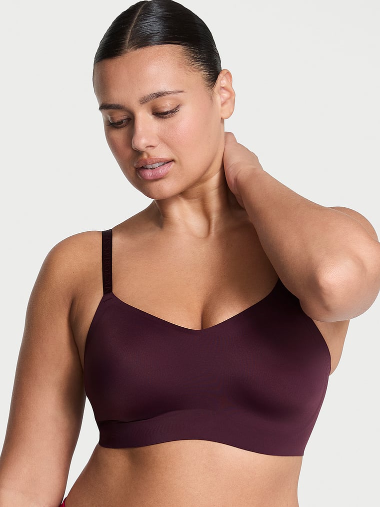 Victoria's Secret, The T-shirt Lightly Lined Wireless Comfort Bra, Winter Wine, onModelFront, 1 of 3 Karmi is 5'10" and wears 34DD (E) or Large