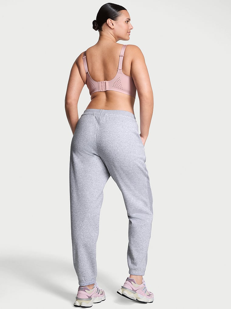 Victoria's Secret, VSX VSX Movement Fleece Relaxed Jogger, Medium Heather Grey, onModelBack, 4 of 5 Karmi is 5'10" and wears Large