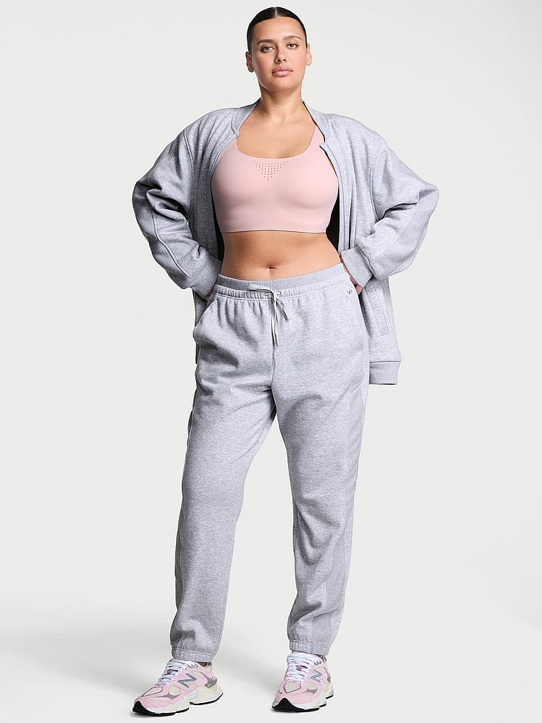 Victoria's Secret, VSX VSX Movement Fleece Relaxed Jogger, Medium Heather Grey, onModelFront, 3 of 5 Karmi is 5'10" and wears Large