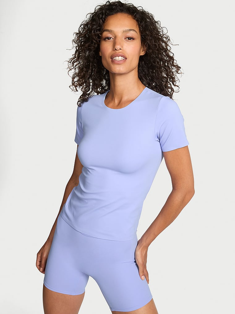 Victoria's Secret, VSX VSX Elevate™ Tee, Blue Energy, onModelFront, 1 of 4 Nikita  is 5'10" or 178cm and wears Small