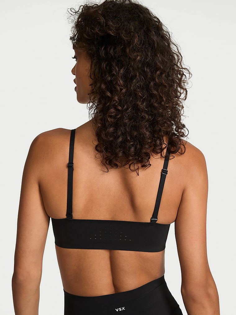 Victoria's Secret, VSX VSX Featherweight™ Light Balconette Sports Bra, Black, onModelBack, 2 of 4 Ari is 5'9" and wears 34B or Small