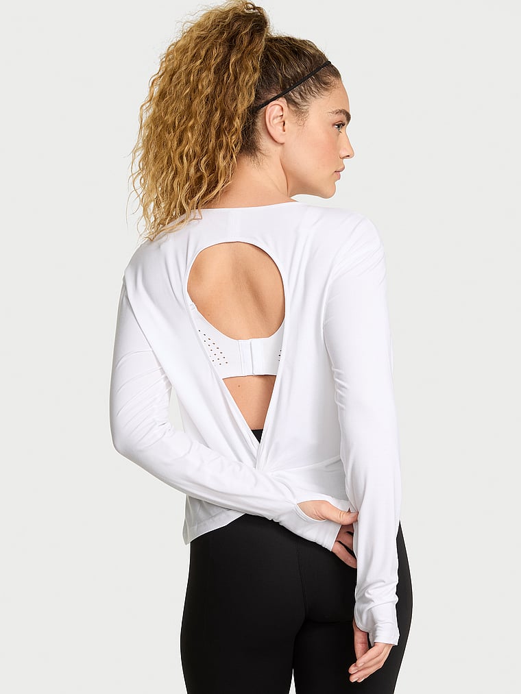 Victoria's Secret, VSX VSX Drapey Knit Long-Sleeve Open-Back Tee, Vs White, onModelBack, 2 of 3 Kiana is 5'9" and wears Small