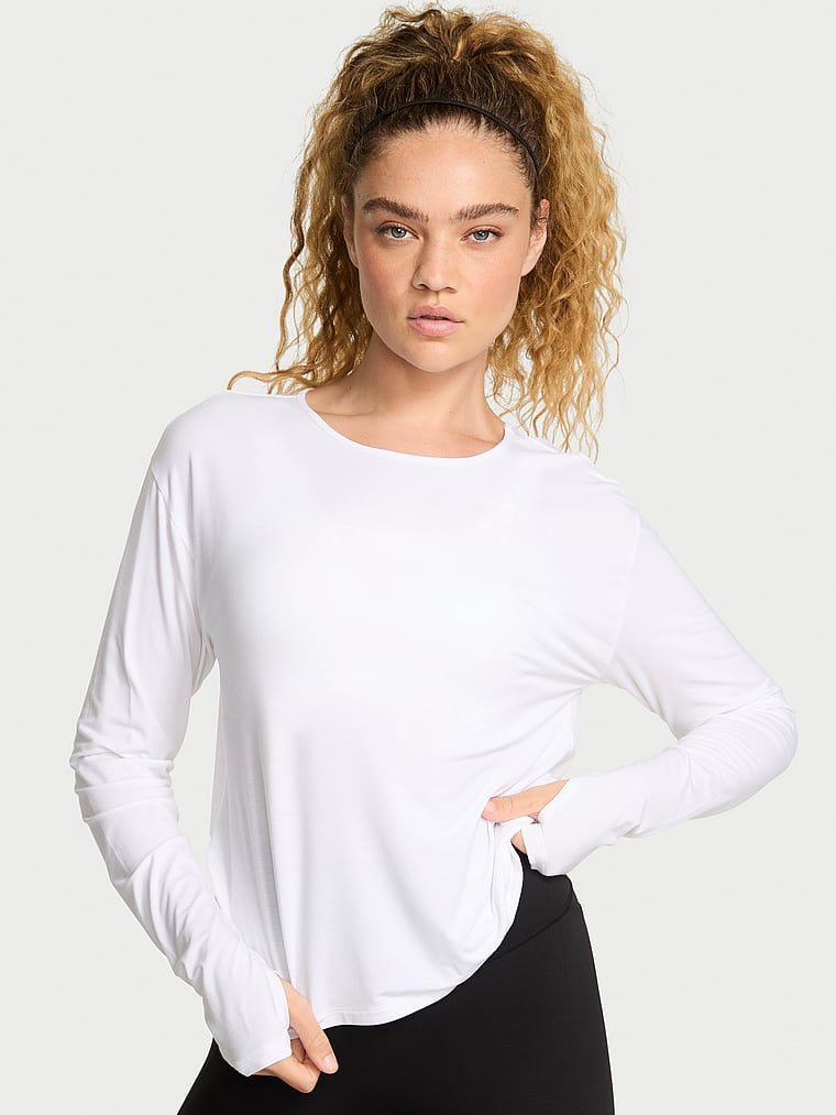 Victoria's Secret, VSX VSX Drapey Knit Long-Sleeve Open-Back Tee, Vs White, onModelFront, 1 of 3 Kiana is 5'9" and wears Small