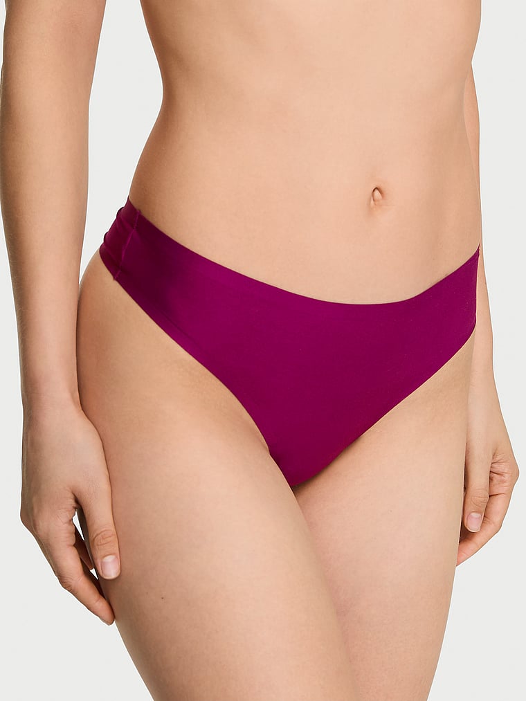 Victoria's Secret, Body by Victoria Body by Victoria Flex Mid-Rise Thong Panty, Fresh Jam, onModelFront, 1 of 4 Lotta is 5'10" and wears Small