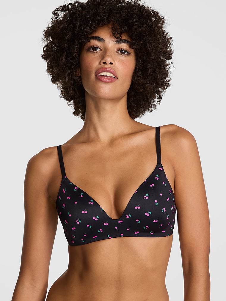 PINK Wear Everywhere Wear Everywhere Push-Up Wireless Bra, Black Cherry Print, onModelFront, 1 of 3 Vanessa is 5'10" or 178cm and wears 32B or Small