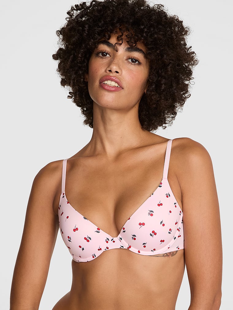 PINK Wear Everywhere Wear Everywhere Push-Up Bra, Pink Tulip Cherry Print, onModelFront, 1 of 4 Vanessa is 5'10" or 178cm and wears 32B or Small
