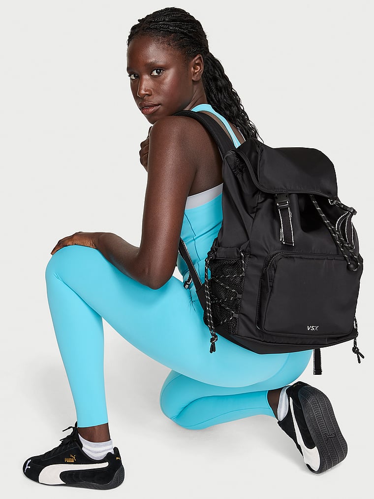 Victoria's Secret, Victoria's Secret VSX Flap Backpack, Black Nylon, onModelSide, 3 of 4