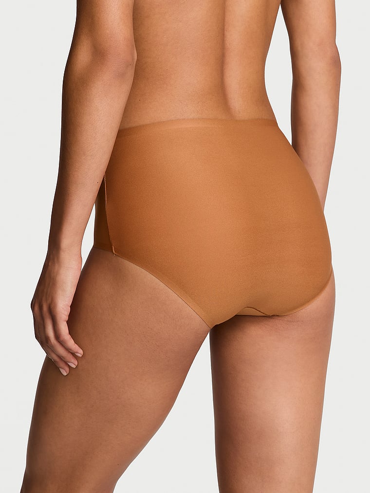 Victoria's Secret, Body by Victoria Body by Victoria Flex Mid-Rise Modern Brief Panty, Sandalwood, onModelBack, 2 of 3 Nikita is 5'10" or 178cm and wears Small