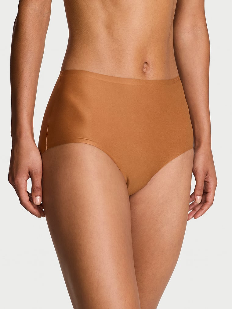 Victoria's Secret, Body by Victoria Body by Victoria Flex Mid-Rise Modern Brief Panty, Sandalwood, onModelFront, 1 of 3 Nikita is 5'10" or 178cm and wears Small