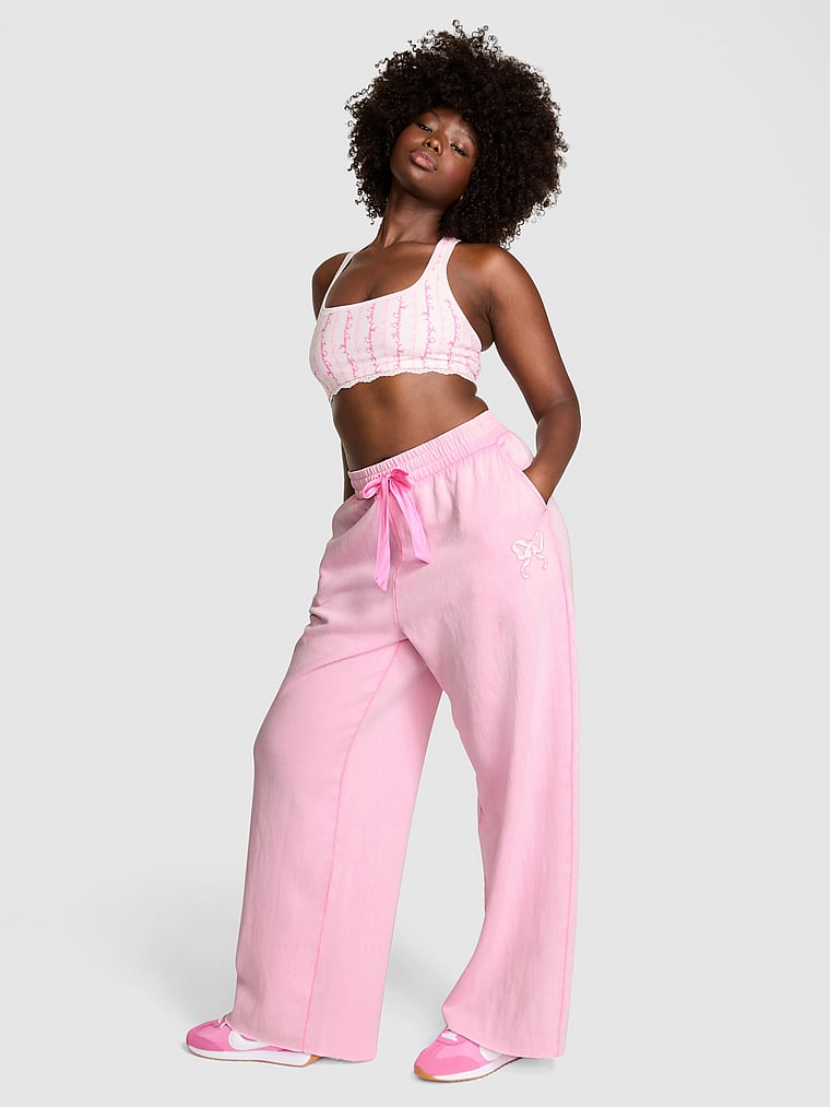 PINK X LoveShackFancy PINK x LoveShackFancy Wide-Leg Sweatpants, Pink Lollipop, onModelSide, 5 of 5 Fanta is 5'11" and wears Medium