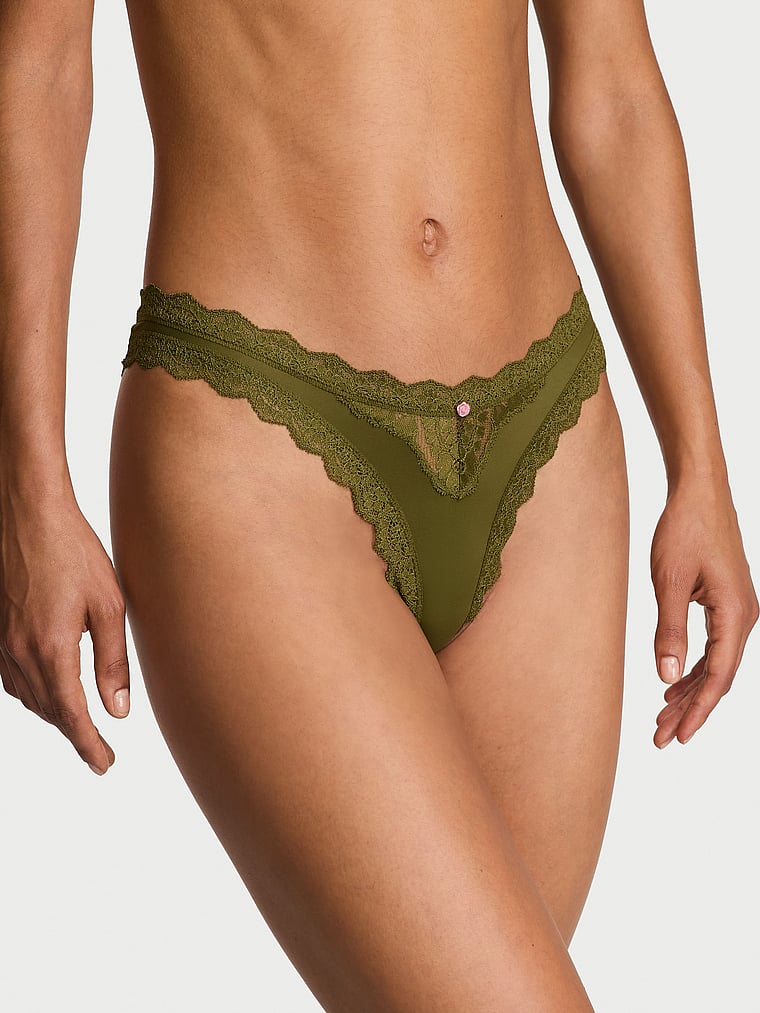 Victoria's Secret, Dream Angels Lace Rhinestone Heart Hardware Brazilian Panty, Green Chameleon, onModelFront, 1 of 3 Nikita is 5'10" and wears Small