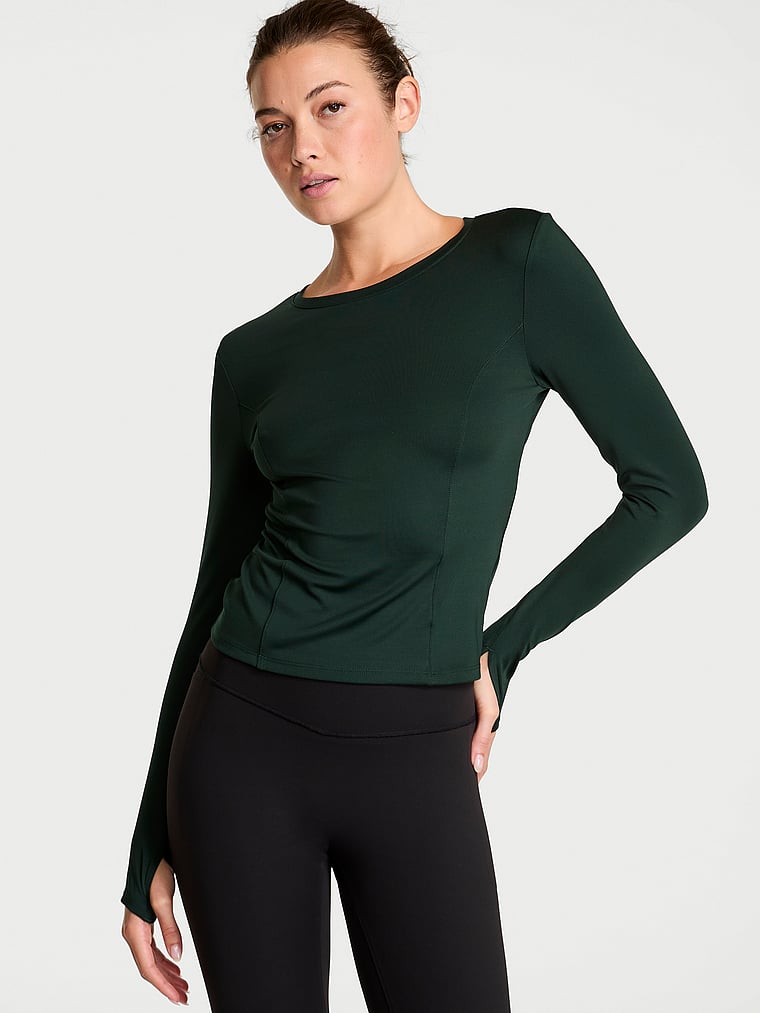 Victoria's Secret, VSX VSX Essential Long-Sleeve Cut-Out Top, Cilantro, onModelFront, 1 of 4 Kennidy is 5'11" and wears Small