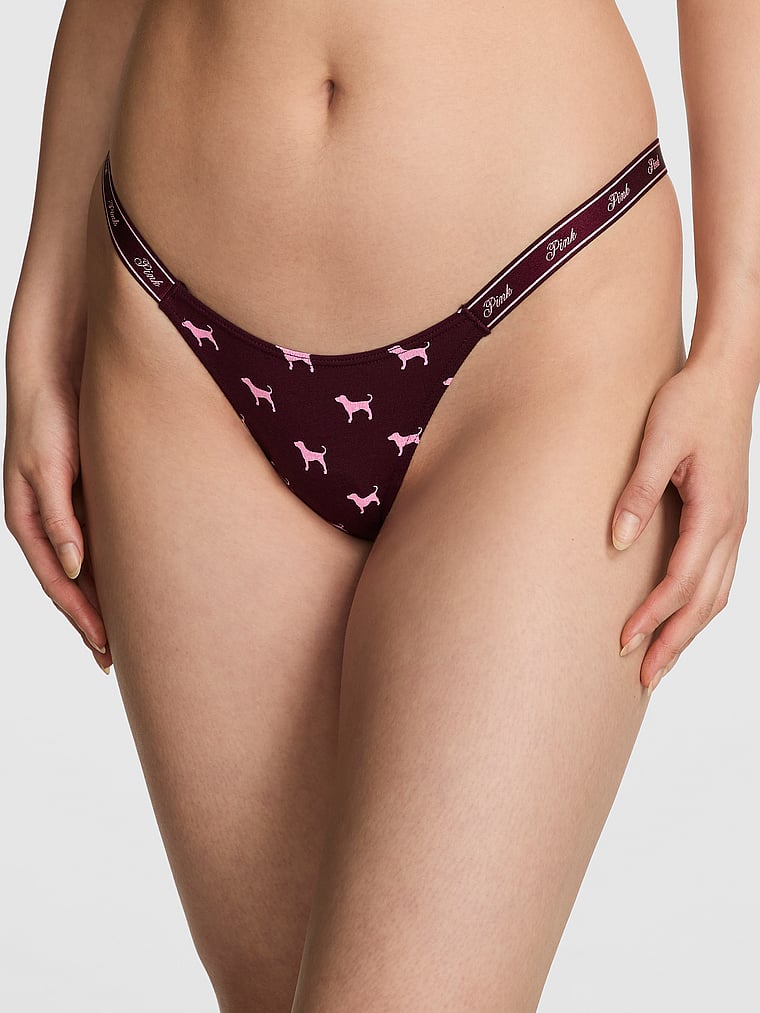 PINK Logo Cotton High-Leg Micro Thong Panty, Wild Rose Dog Print, onModelFront, 1 of 3 Gloria is 5'9" or 175cm and wears Small
