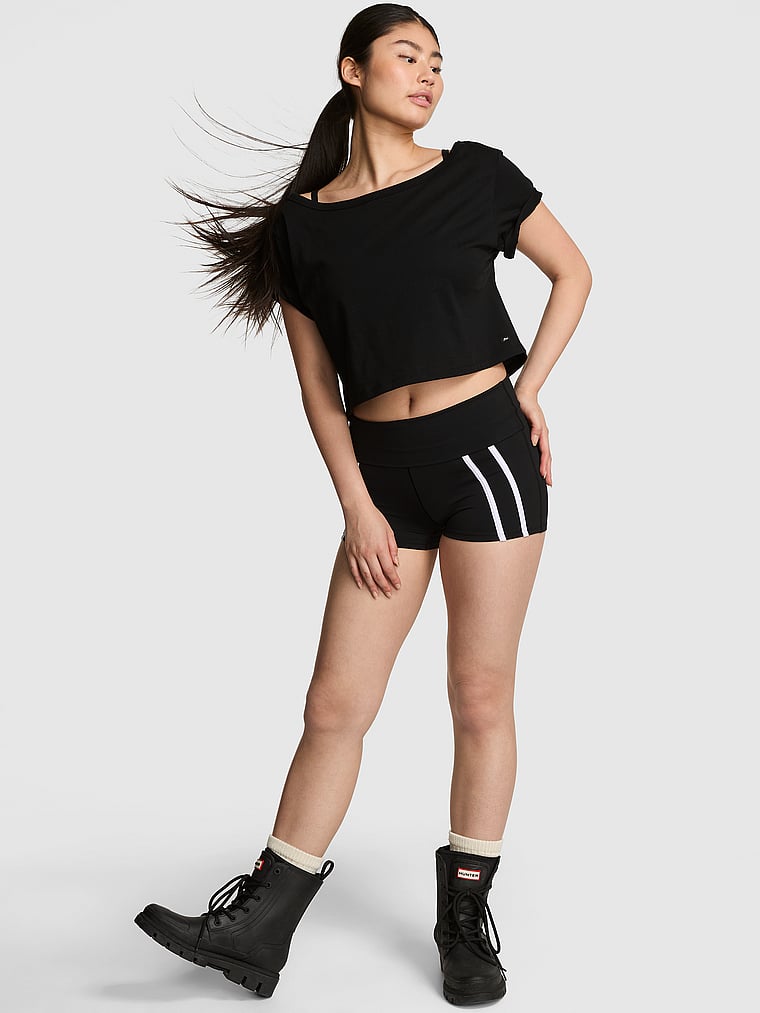 PINK Relay Colorblock Foldover Micro Shorts, Pure Black, onModelFront, 1 of 3 Gloria is 5'9" or 175cm and wears Small