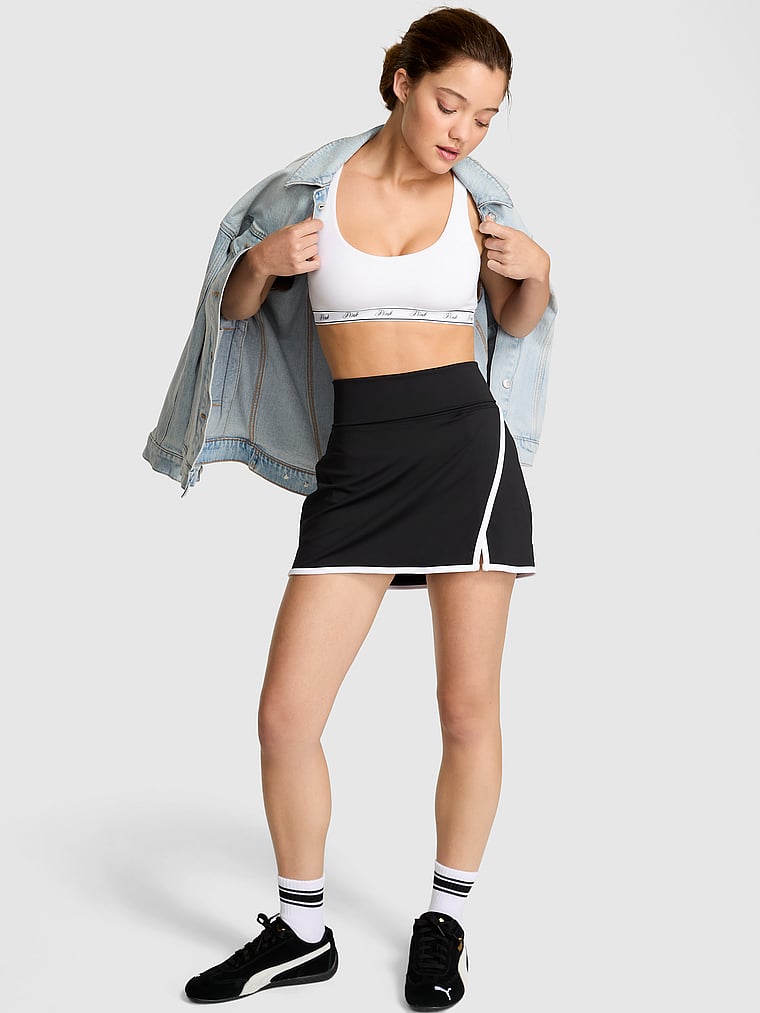 PINK Relay Colorblock Skort, Pure Black, onModelFront, 1 of 5 Ruby is 5'6" or 168cm and wears Small