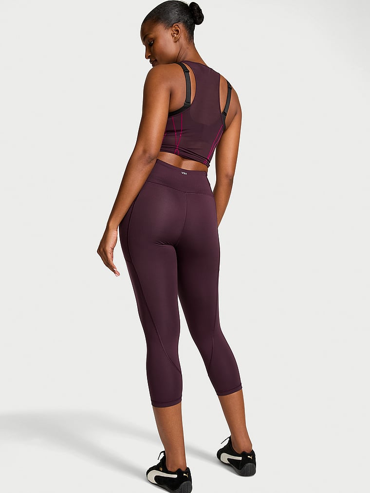 Victoria's Secret, VSX VSX Essential Pocket Capri Legging, Winter Wine, onModelBack, 2 of 2 Tsheca  is 5'9" and wears Small