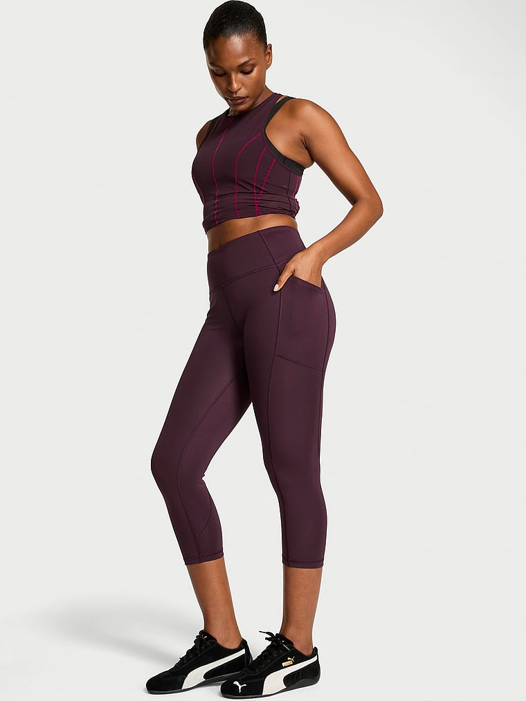 Victoria's Secret, VSX VSX Essential Pocket Capri Legging, Winter Wine, onModelFront, 1 of 2 Tsheca  is 5'9" and wears Small