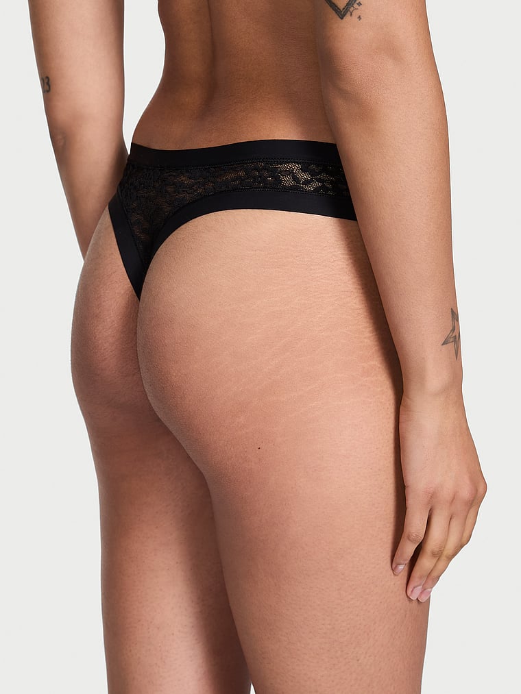 Victoria's Secret, No-Show No-Show Stripe Mesh Thong Panty, Black, onModelBack, 4 of 4 Anisha is 5'11" and wears Small