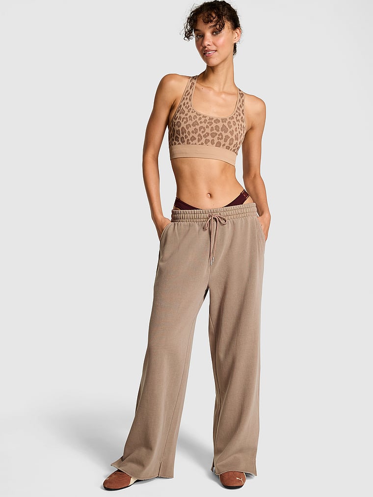 PINK Ivy Fleece Wide-Leg Split-Hem Sweatpants, Iced Coffee, onModelFront, 1 of 3 Rae is 5'10" and wears Small