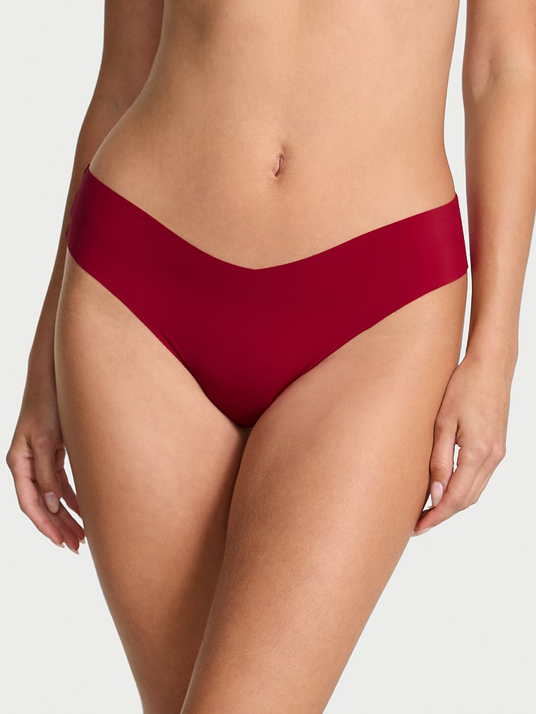 Victoria's Secret, No-Show No Show Strappy Thong Panty, Red Lacquer, onModelFront, 1 of 3 Ari is 5'9" or 175cm and wears Small
